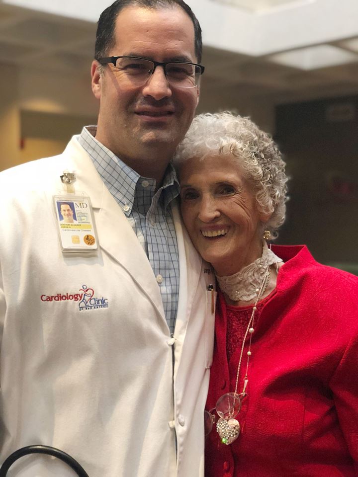 Male doctor and 95-year-old female patient