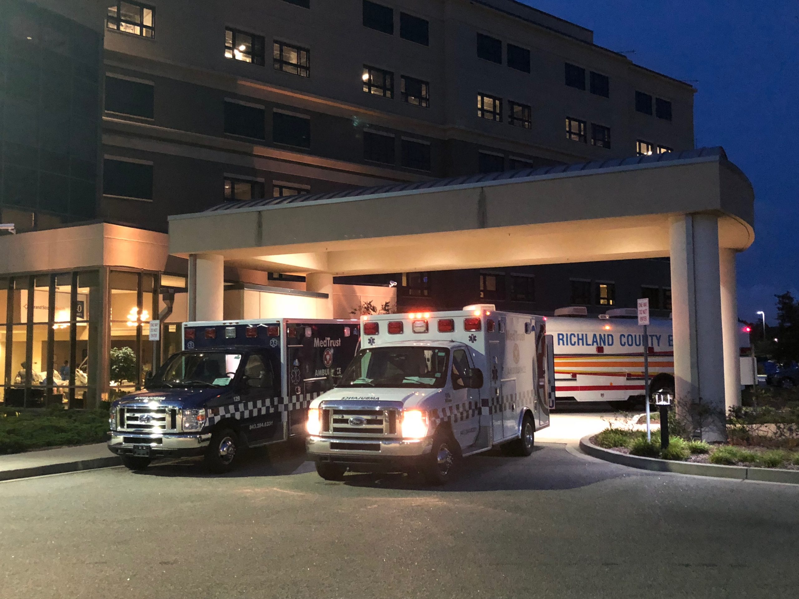 Two ambulances at hospital entrance