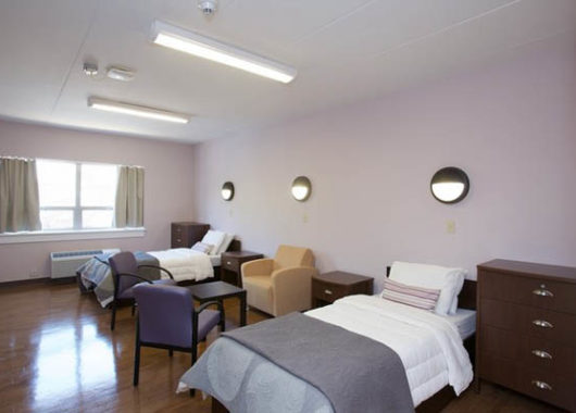 Hospital patient room with two beds