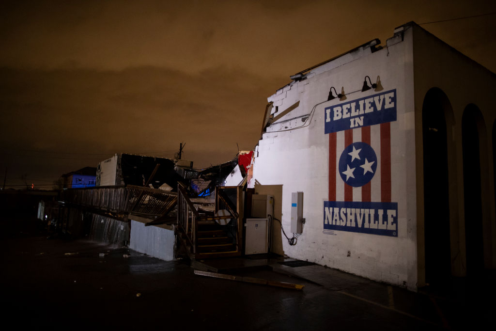 An I Believe in Nashville mural remains intact amid rubble after a tornado passed through Middle Tennessee