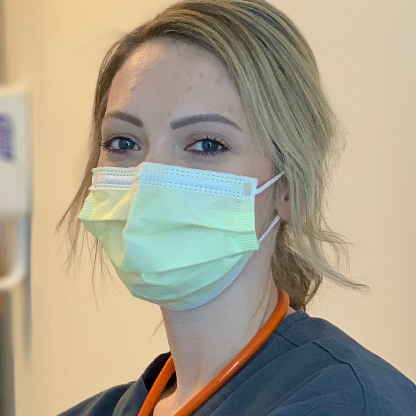 Nurse Heather Godfrey wearing a face mask