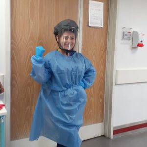 A nurse wearing personal protective equipment