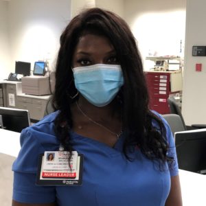 Female nurse wearing a face mask. Headshot of Marquita Sparkman.