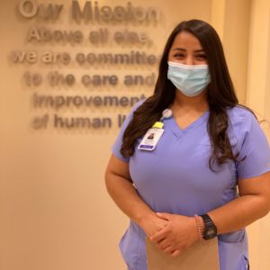 Female emergency room technician wearing a face mask. Headshot of Zujeidy Torres. 