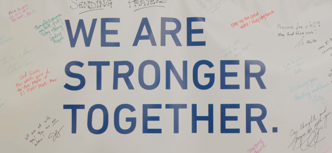 Sign that says We Are Stronger Together