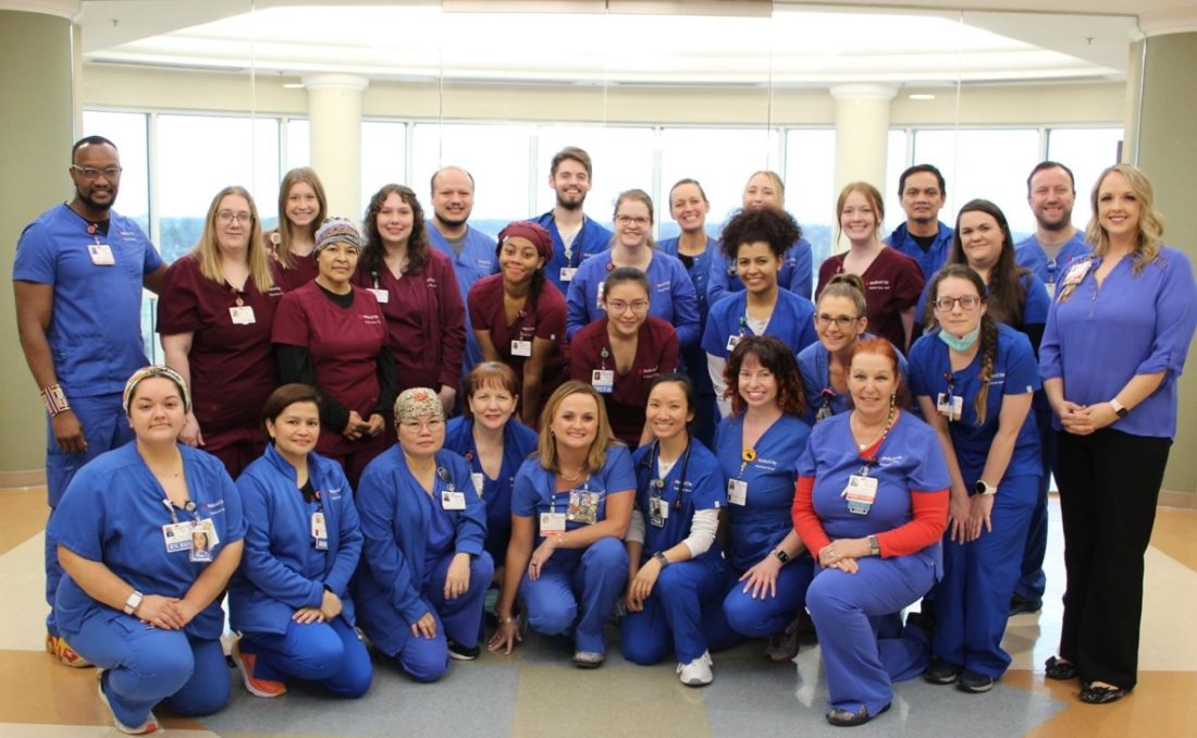 Medical City Denton colleagues smile for picture 