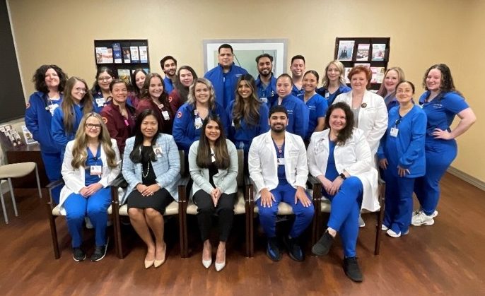 Medical City Plano medical oncology colleagues smiling for a group picture. 